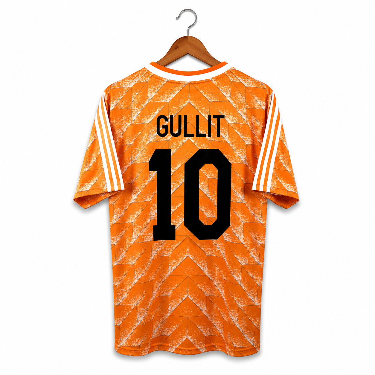 Orange sports jersey with 'Gullit' and number '10' on a hanger against a white background